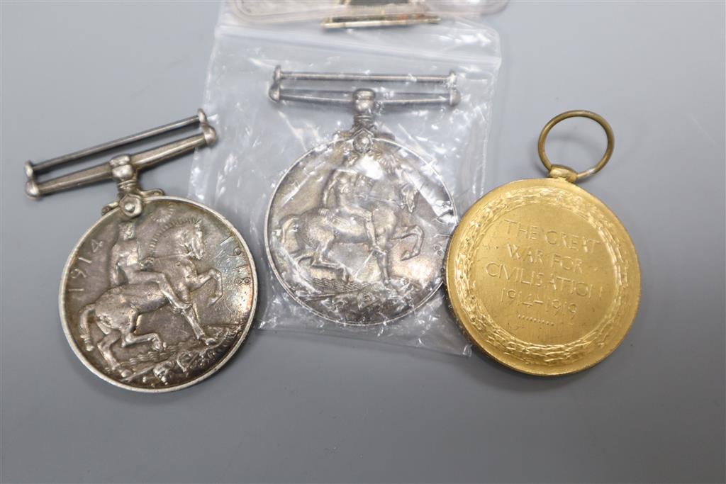 A German Iron Cross together with two British WWI medals and a Victory medal